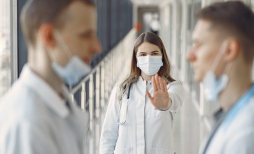 woman-stopping-men-not-wearing-proper-face-mask-3985151 woman-stopping-men-not-wearing-proper-face-mask-3985151